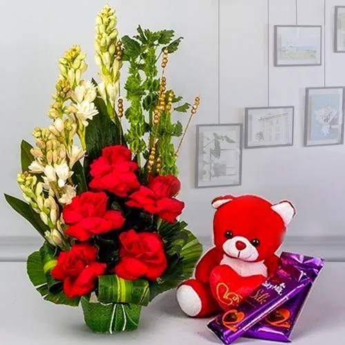 Mesmerizing Fresh Flowers with Teddy n Cadbury Chocolates Gift Combo