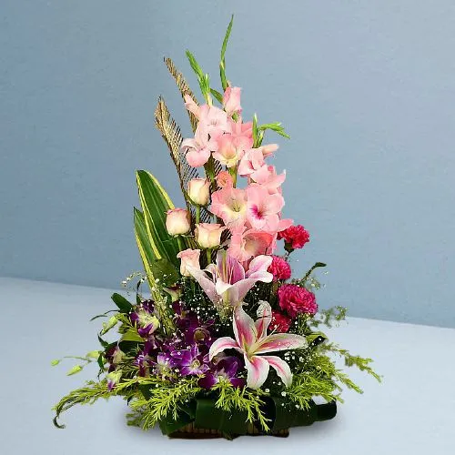 Classy Basket of 16 Mixed Flowers in Pink