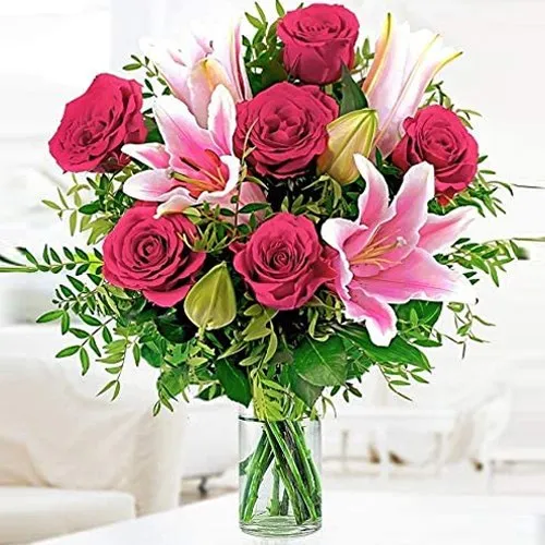 Lovely Glass Vase display of Red Roses with Pink Lilies

