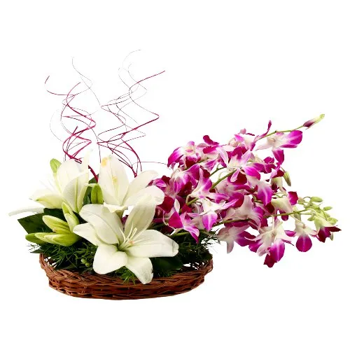 Blooming White lilies with Orchids Basket Arrangement
