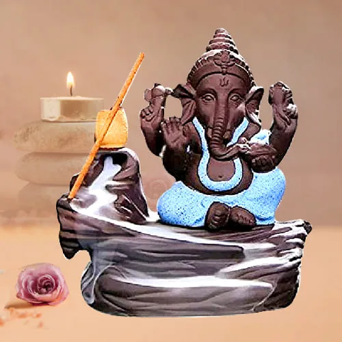 Beautiful Bal Ganesha Smoke Fountain Polyresin Showpiece