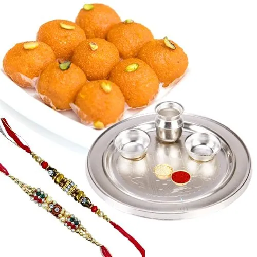 Pride-to-Possess Silver Plated Thali with <font color=#FF0000>Haldiram</font> Ghee Ladoo & 2 Designer Rakhi and Roli Tilak Chawal