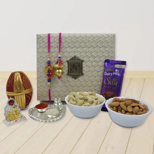 Pious Lumba Rakhi Set with Pooja Items, Dry Fruits n Cadbury Silk