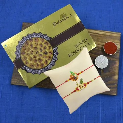 Toothsome Rasgulla from Balaram Mullick with Twin Ethnic Rakhi