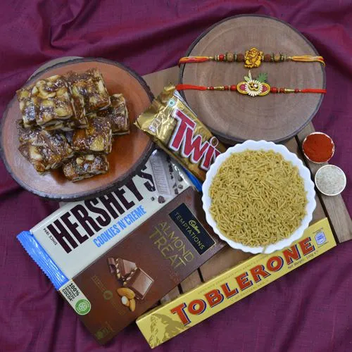 Designer Rakhi Set with Haldiram Sweets N Savory  N  Chocolates Hamper