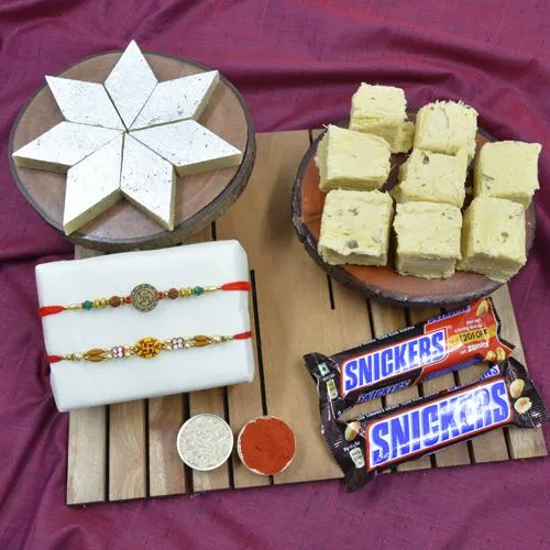 Divine Swastik Rakhi with Haldiram Sweets N Imported Snickers