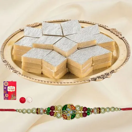 250g Mouthwatering Kaju Katli with a designer Rakhi with free Roli Tilak Chawal