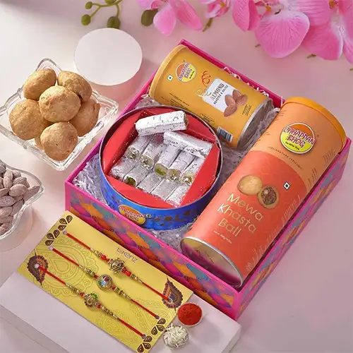 Delightful Chappanbhog Triple Rakhi Hamper