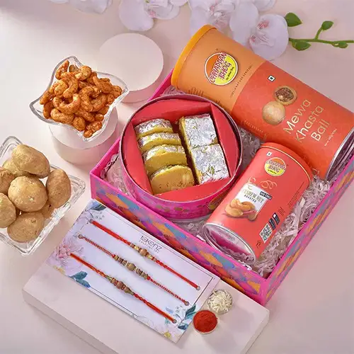 Stunning Tripple Rakhi n Treats Hamper