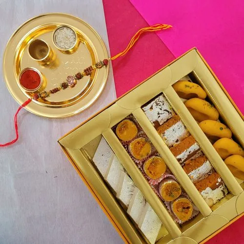 Sensational Ganesh Rakhi with Sweets  N  Golden Rakhi Thali