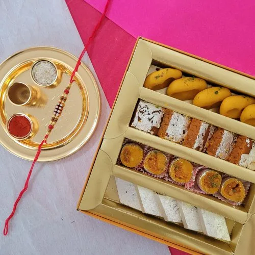 Flattering Stone Rakhi  N  Assorted Sweets with Golden Rakhi Thali
