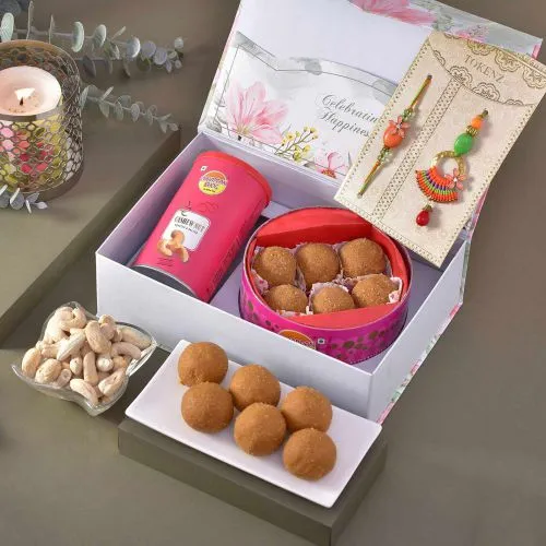 Amazing Bhaiya Bhabhi Rakhi with Sweet N Nut Hamper Box
