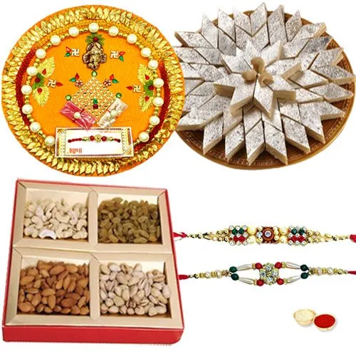 Exclusive Pooja thali with Kaju Katli, Dry Fruits and 2 free Rakhi, Roli Tika and Chawal