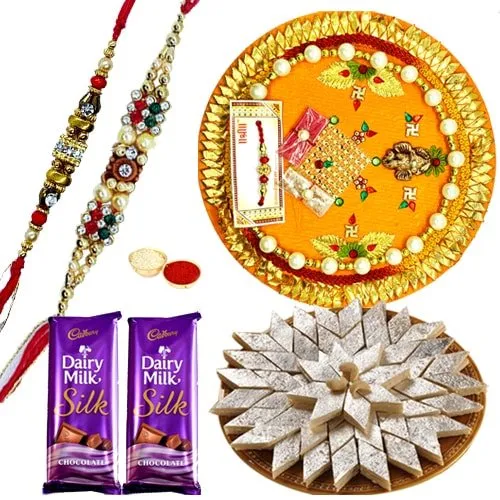 Wonderful Pooja Thali, Yummy Kaju Katli, Gift Voucher from Pantaloons with 2 free Rakhi, Roli Tilak and Chawal