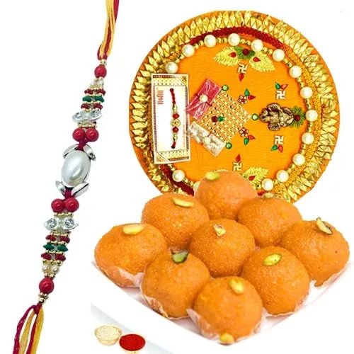 Laddoo and Designer Pooja Thali along Rakhi, Roli, Tilak and Chawal