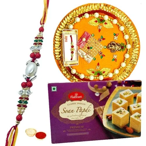 Soan Papri and Designer Pooja Thali along Rakhi, Roli, Tilak and Chawal