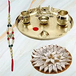 Kaju Katli from Haldiram and Silver Plated Paan Shaped Puja Aarti Thali along with Rakhi