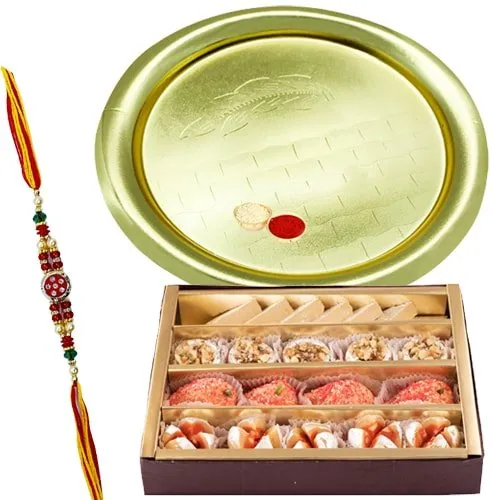 Assorted Sweets and Silver Plated Puja Thali along Rakhi, Roli, Tilak and Chawal