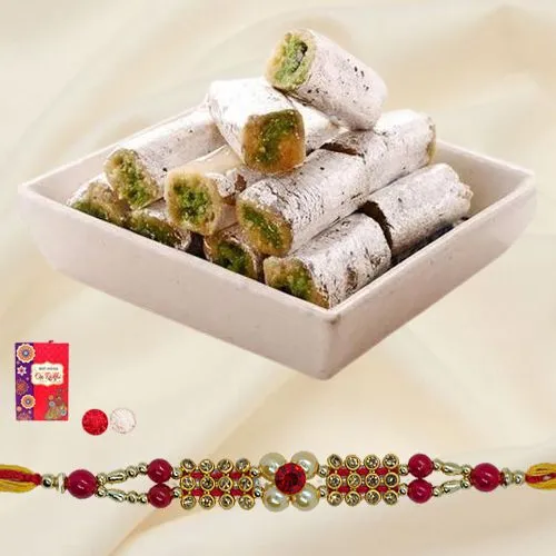 Tasty Kaju Pista Roll & fancy Rakhi with free Roli Tilak Chawal