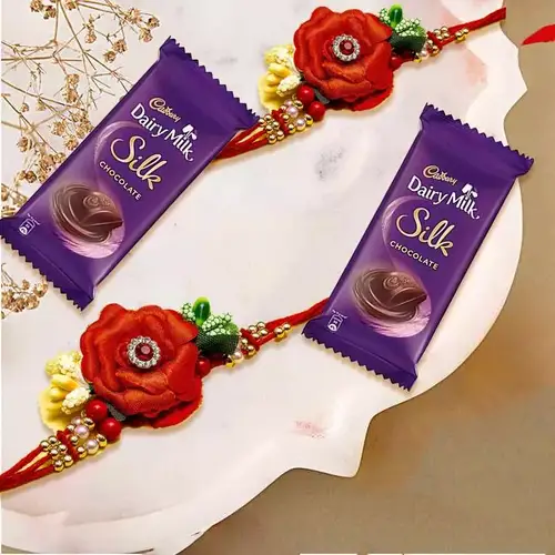 Scintillating Twin Flower Rakhi Set with Cadbury Dairy Milk Silk Chocolate Bar