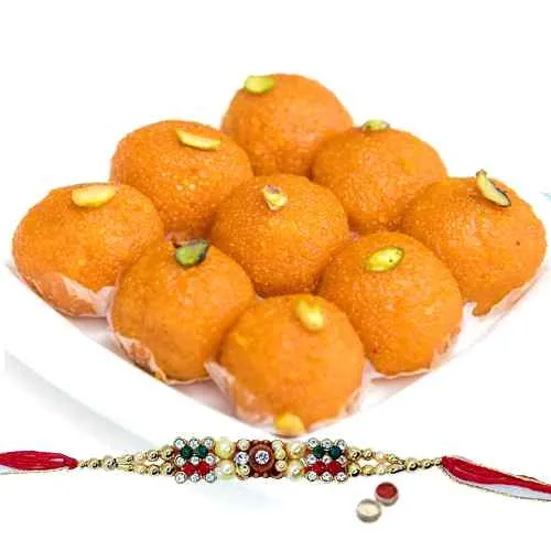 A Free Decorative Rakhi, Roli Tilak and Chawal with <font color=#FF0000>Haldiram</font> Pure Ghee Ladoo