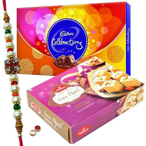 Free Rakhi, Roli Tilak and Chawal along with <font color=#FF0000>Haldiram</font> Soan Papri and Celebration Chocolates