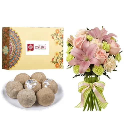 Delicious Sunnundalu from Estaa Sweets with Flowers Bouquet