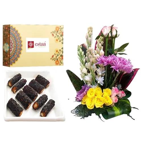 Satisfying Kaju Chocolate Roll from Estaa Sweets with Mixed Flower Arrangement