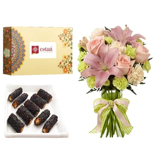 Scrumptious Kaju Chocolate Roll from Estaa Sweets with Flowers Bouquet