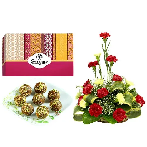 Marvelous Dry Fruits Ladoo from Sangam Sweets with Colorful Carnations Arrangement