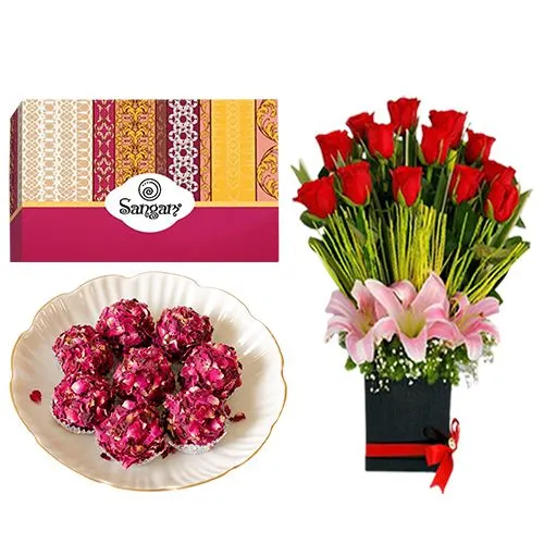 Tempting Kaju Rose Laddu from Sangam Sweets with a Designer Flower Arrangement