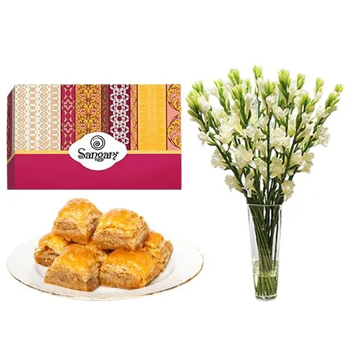 Delicious Desi Baklava from Sangam Sweets with Rajnigandha Stems in a Glass Vase
